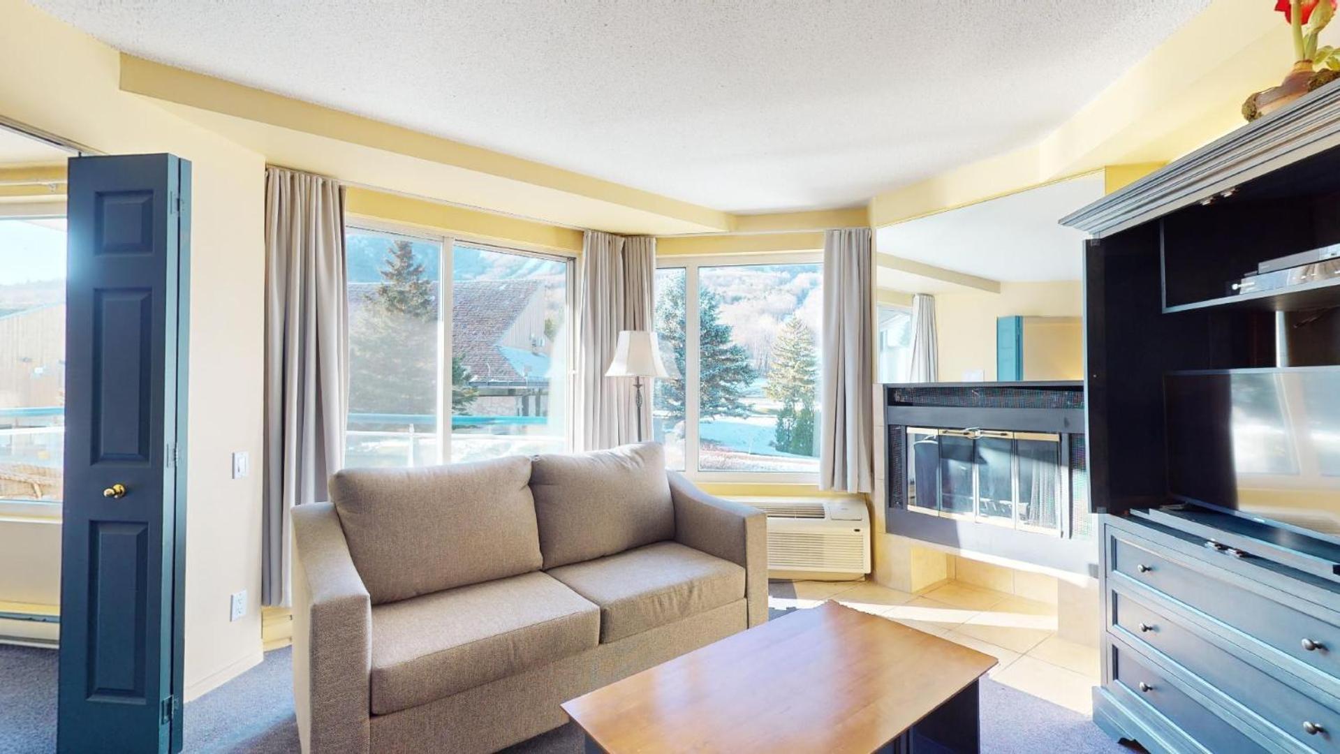 Hebergement Mont-Ste-Anne Condos Бопре Номер фото